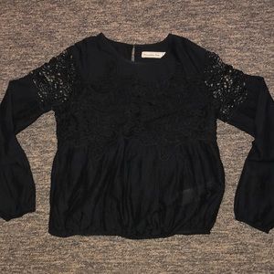 Black lace top with fitted bottom and sleeves